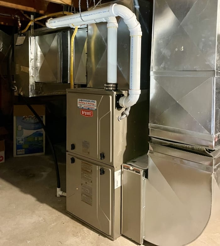 A residential bryant brand furnace installed by Morrisburg Plumbing & Heating.