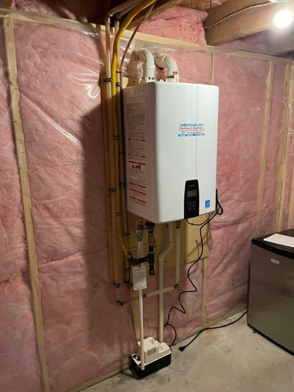 An on-demand water heater installed by Morrisburg Plumbing & Heating